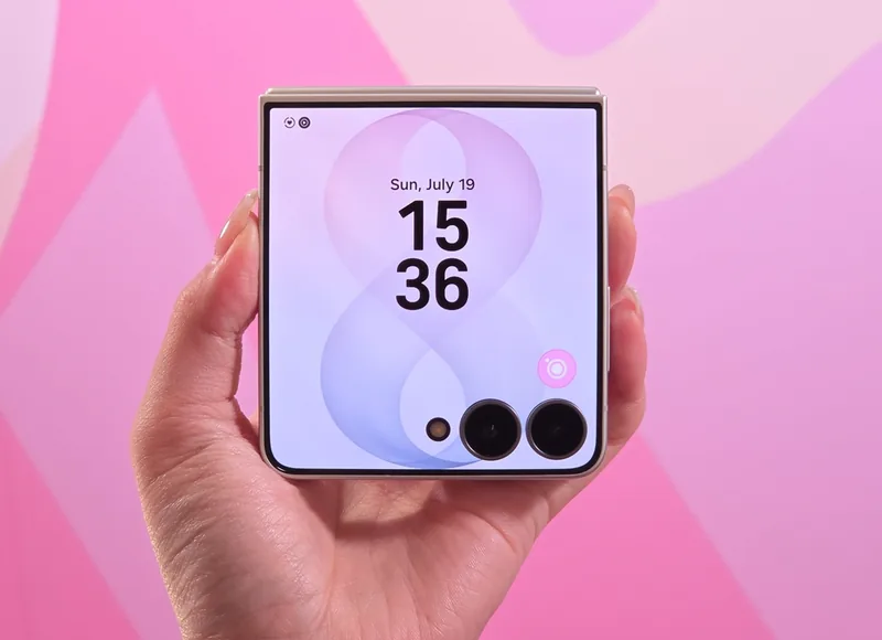 Galaxy Z Flip 8 held closed showing the FlexWindow cover screen